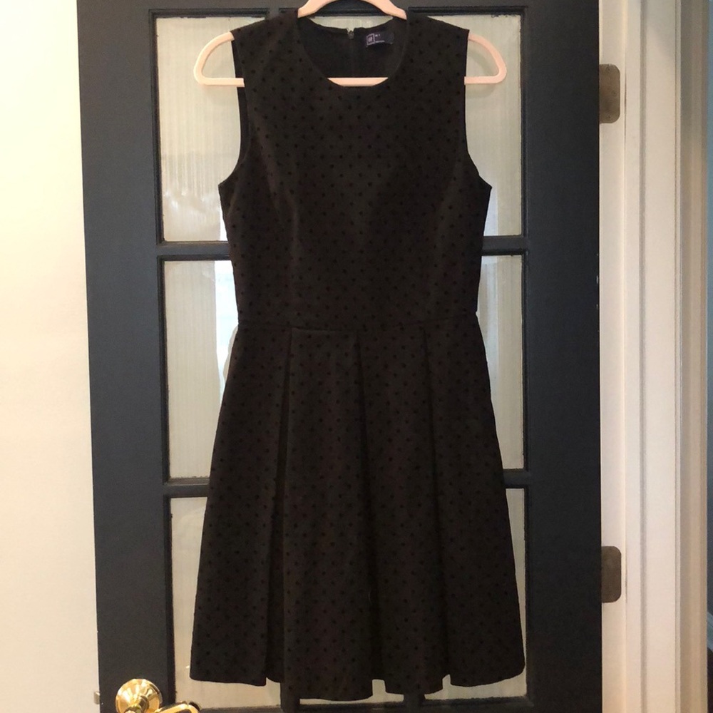 Black polka-dot dress